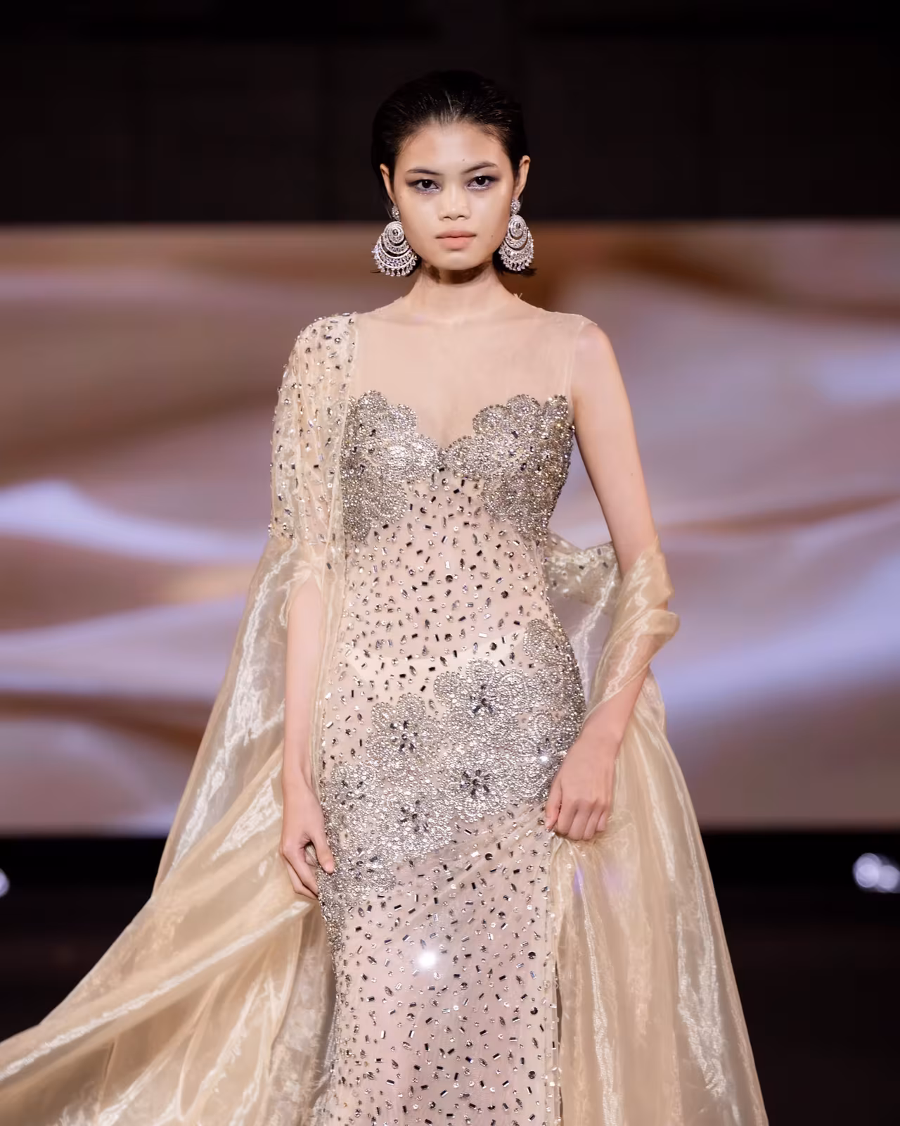 Champagne beaded gown with draped organza, runway